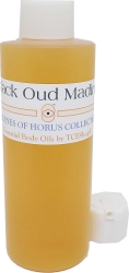 View Buying Options For The Black Oud Madina Scented Body Oil Fragrance